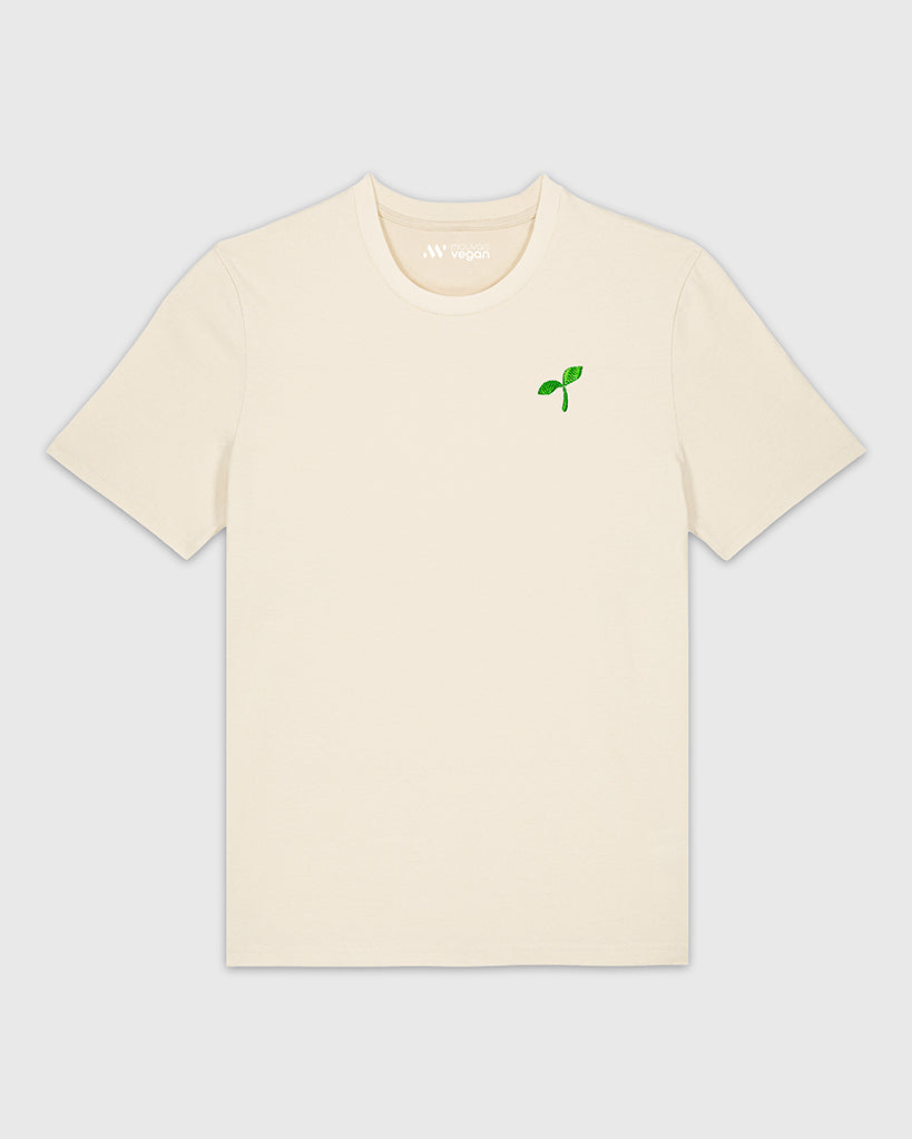 T-shirt beige avec une broderie verte représentant un Emoji Pousse.